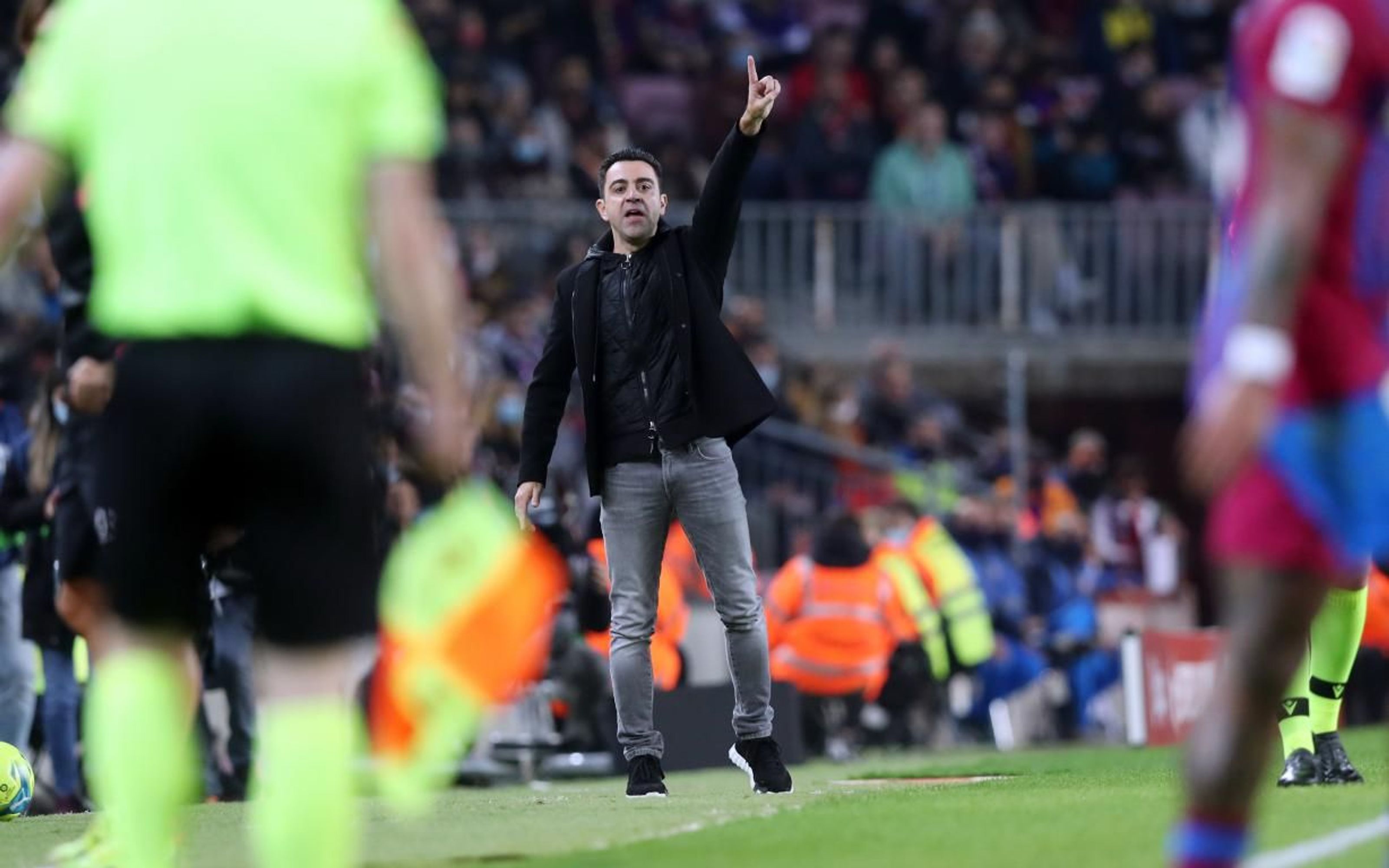 Xavi's debut as coach in photos