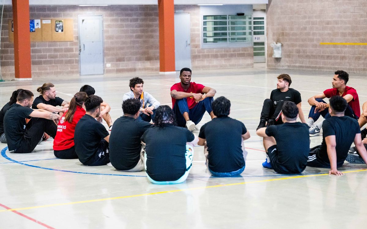 First-team basketball players Oscar da Silva and James Nnaji visit Quatre Camins Juvenile Detention Centre